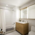Via 57 West Case Study - Custom White Herringbone Tile Bathroom Installation