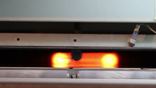 An up close view of tile being fired in a kiln.