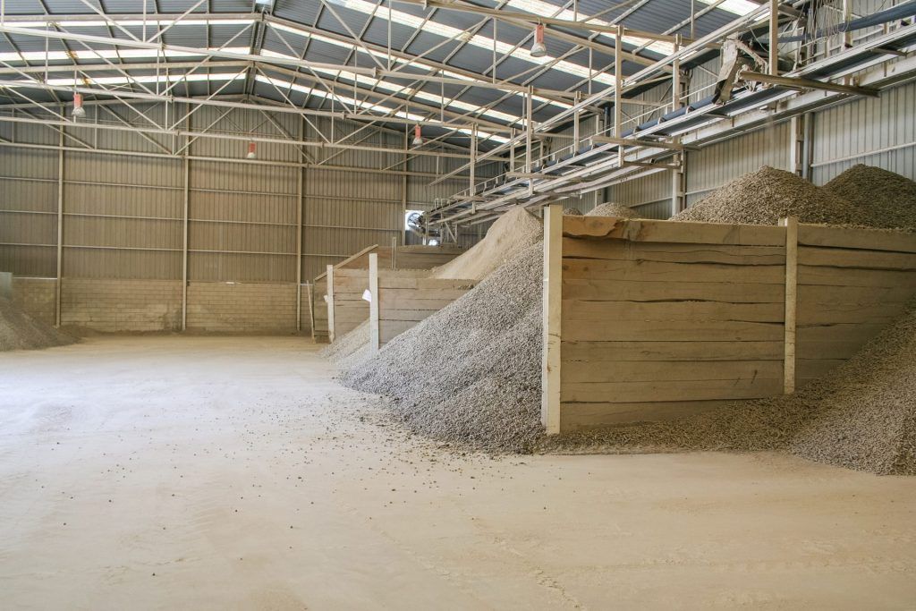 Inside a ceramic factory showing the storage of ingredients used in tile manufacturing.